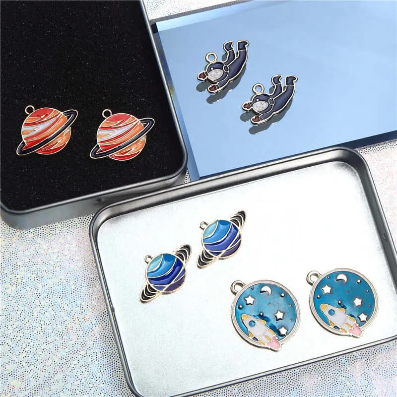 Factory direct alloy jewelry accessories rocket astronaut planet exquisite DIY earrings ear clip pendant material package