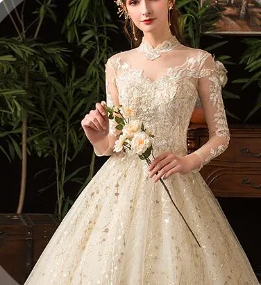 Wedding dress 2022 new star French style long sleeves stand collar Hepburn bride large size peng yarn wholesale