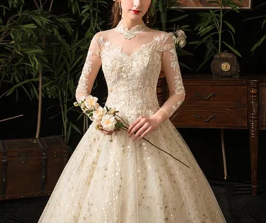 Wedding dress 2022 new star French style long sleeves stand collar Hepburn bride large size peng yarn wholesale