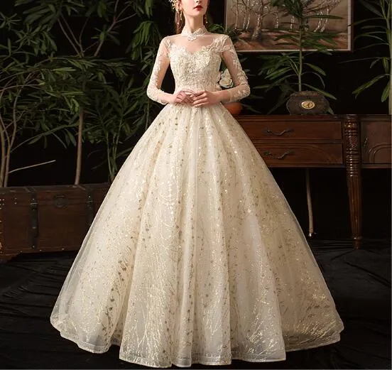 Wedding dress 2022 new star French style long sleeves stand collar Hepburn bride large size peng yarn wholesale