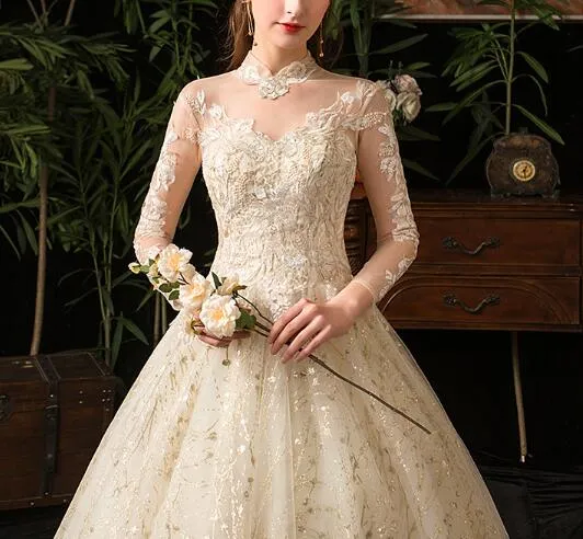 Wedding dress 2022 new star French style long sleeves stand collar Hepburn bride large size peng yarn wholesale