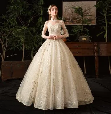 Wedding dress 2022 new star French style long sleeves stand collar Hepburn bride large size peng yarn wholesale